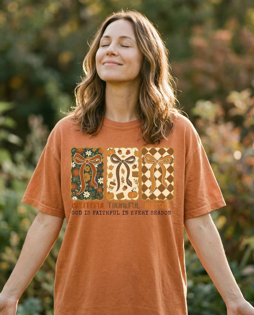 Grateful Thankful Blessed – Citrus women's Christian tee, lifestyle photo in outdoor garden – Three decorative rectangular panels each with a bow in different fall  – She Wears Faith
