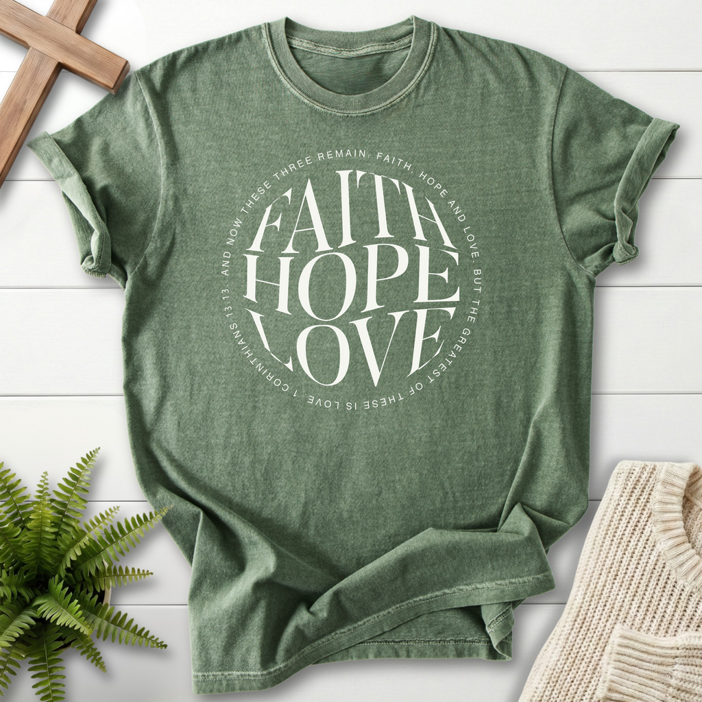 Moss green women's faith t-shirt with bold circular typography and a verse ring, inspired by 1 Corinthians 13:13.