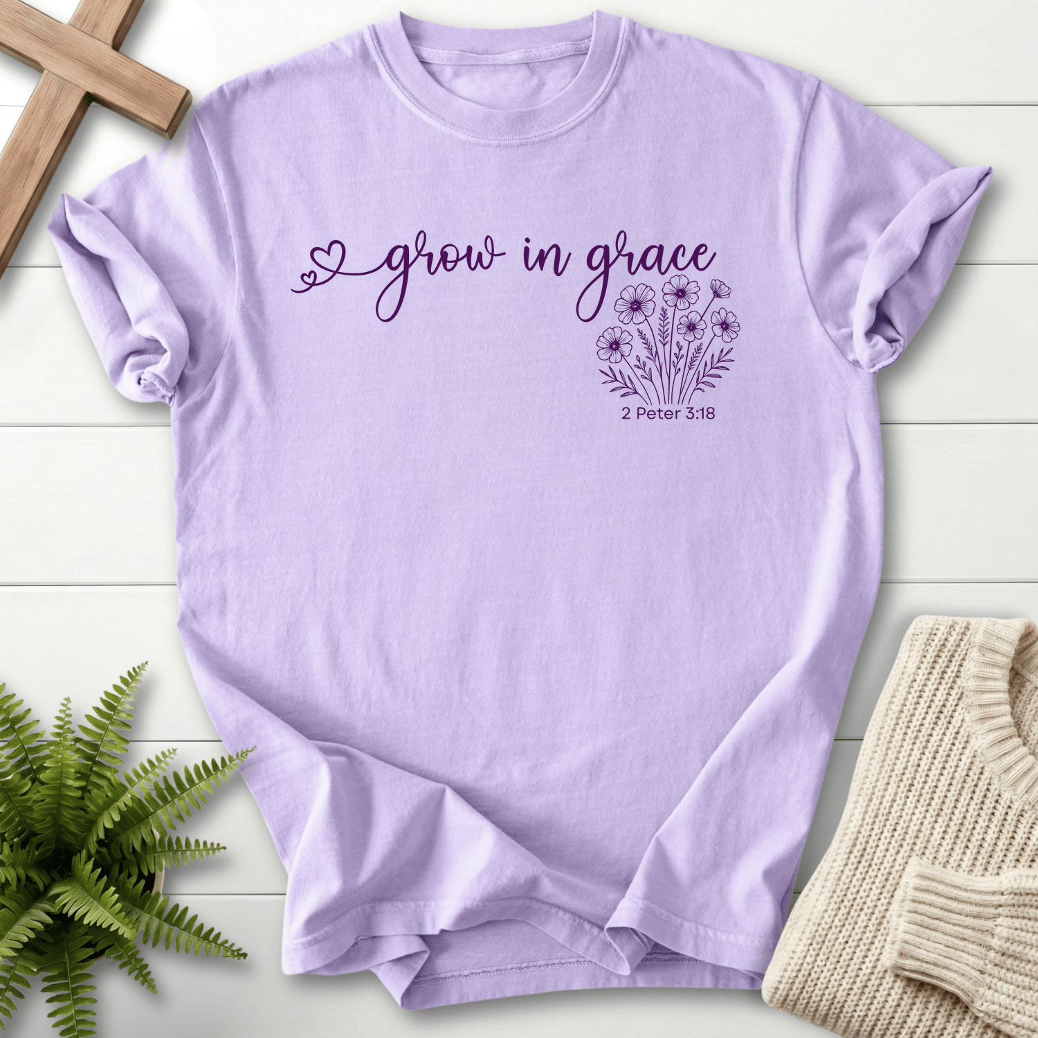 Orchid Bible verse tee with cursive 'grow in grace' and a wildflower bouquet, inspired by 2 Peter 3:18.