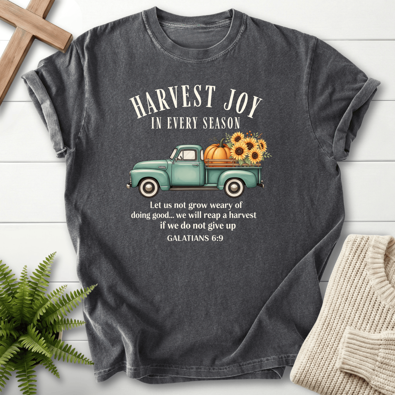 Pepper women's faith t-shirt with a fall farm truck and pumpkin graphic and 'Harvest Joy in Every Season', inspired by Galatians 6:9.
