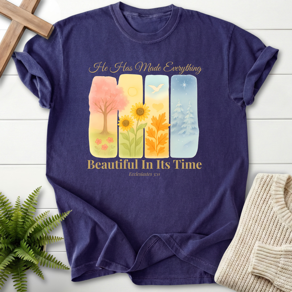Grape Bible verse tee with watercolor seasonal nature panels and 'He Has Made Everything Beautiful in Its Time', inspired by Ecclesiastes 3:11.