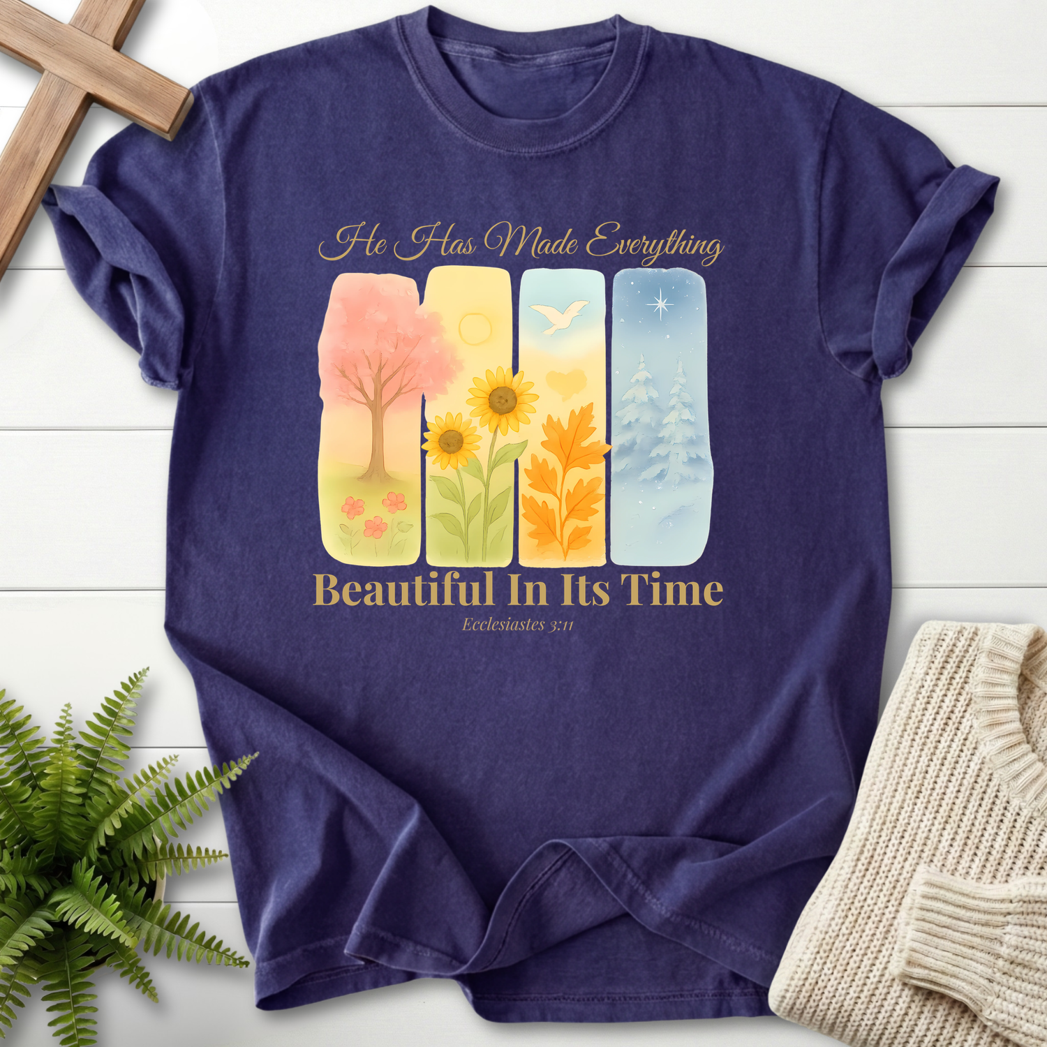 Grape Bible verse tee with watercolor seasonal nature panels and 'He Has Made Everything Beautiful in Its Time', inspired by Ecclesiastes 3:11.