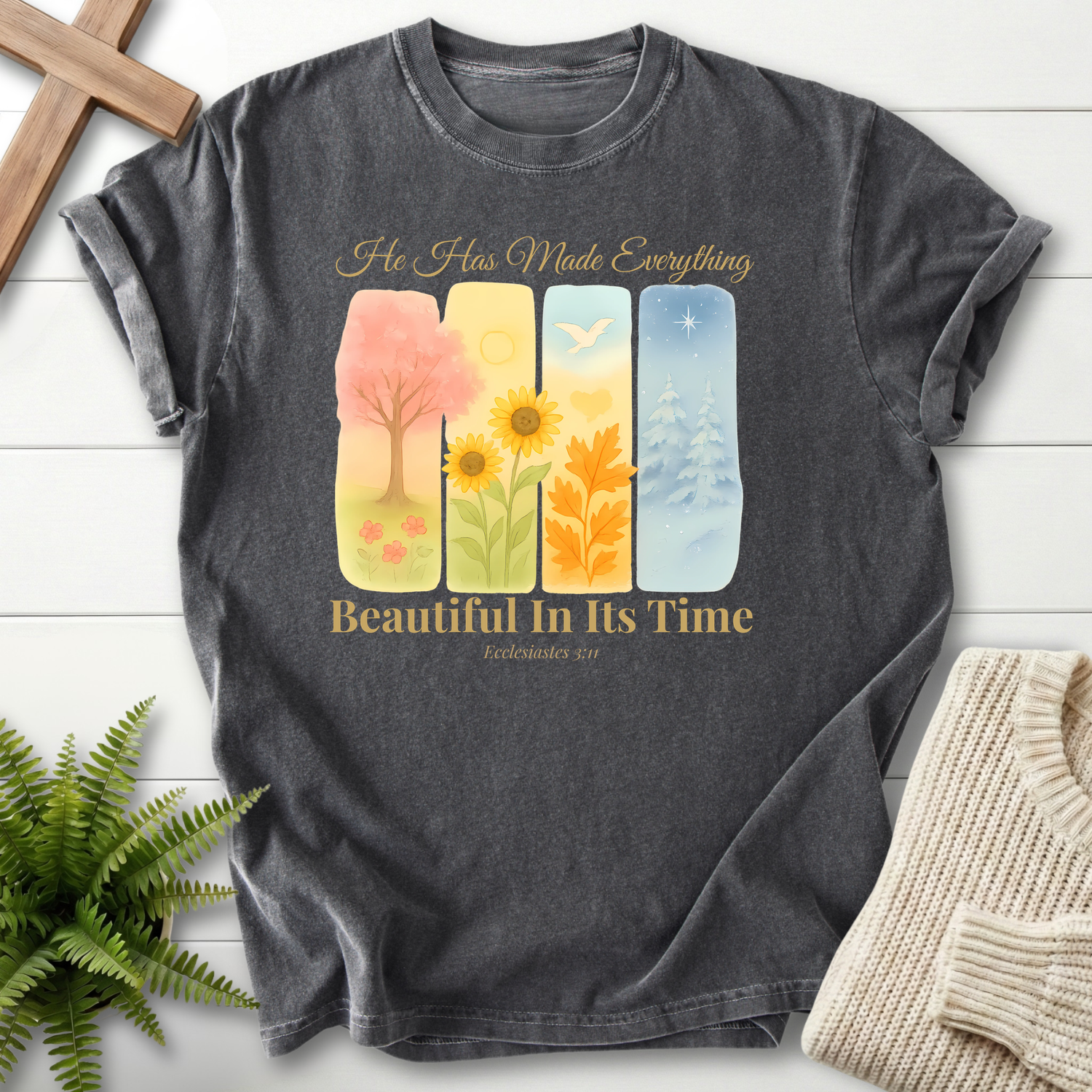 Pepper women's faith t-shirt with a four-seasons watercolor illustration and 'Beautiful In Its Time', inspired by Ecclesiastes 3:11.