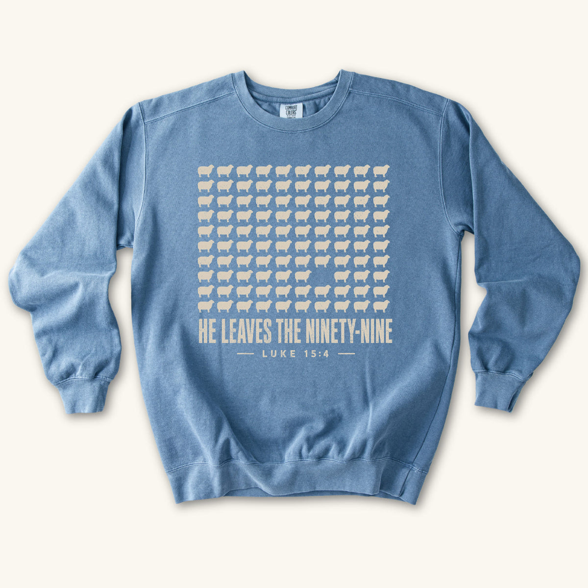 Blue Jean He Leaves the Ninety-Nine sweatshirt flat lay mockup, Luke 15:4 Christian apparel for women