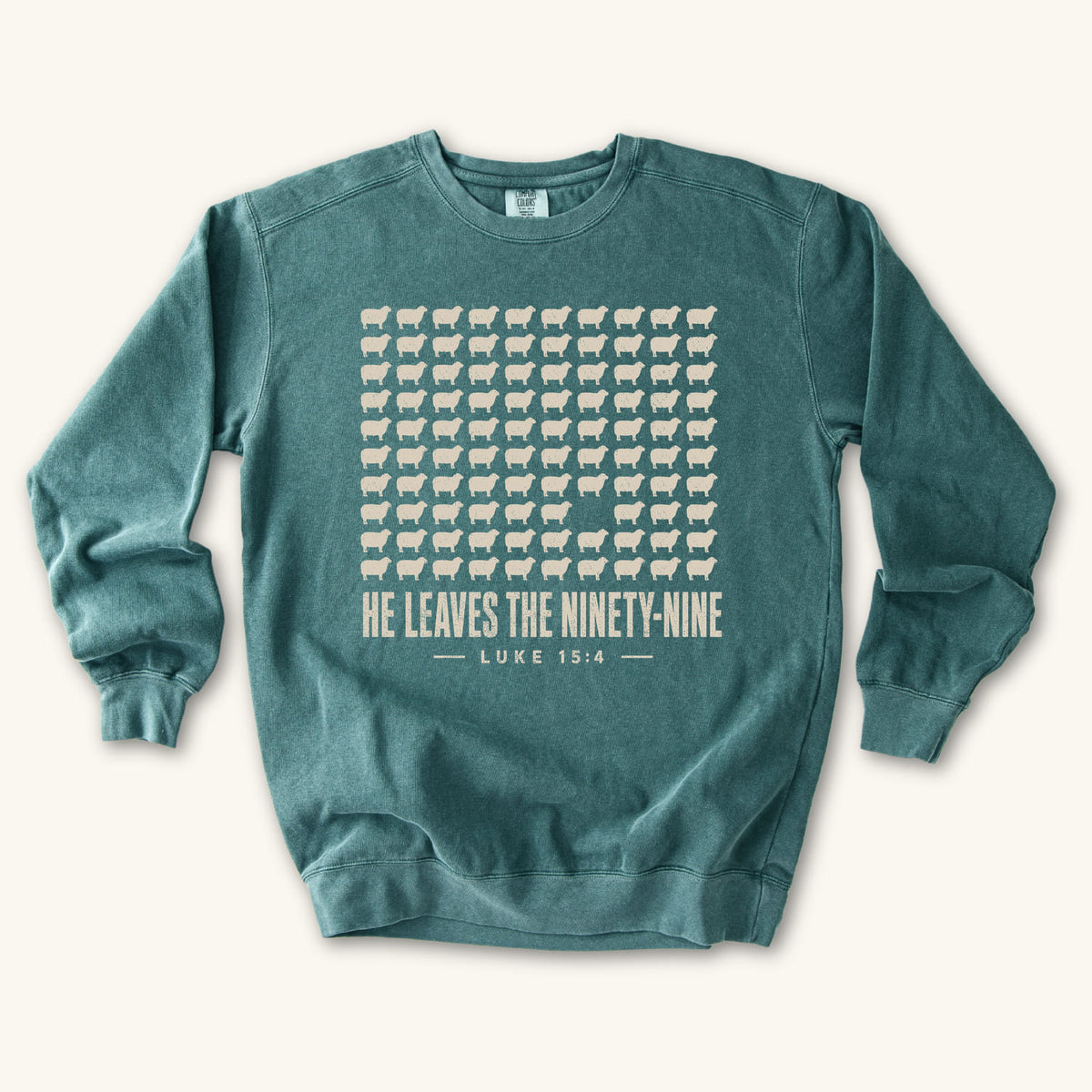 Blue Spruce He Leaves the Ninety-Nine sweatshirt flat lay mockup, Luke 15:4 Christian apparel for women