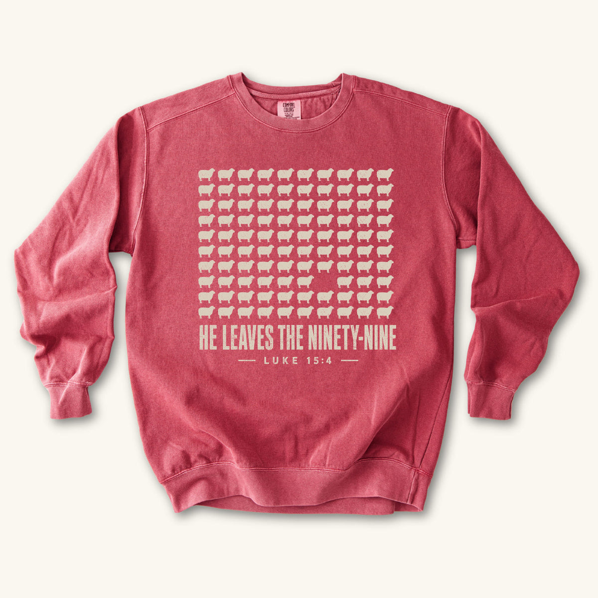 Crimson He Leaves the Ninety-Nine sweatshirt flat lay mockup, Luke 15:4 Christian apparel for women