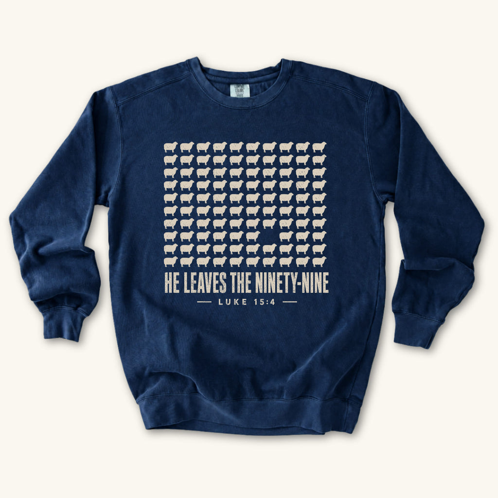 True Navy He Leaves the Ninety-Nine sweatshirt flat lay mockup, Luke 15:4 Christian apparel for women