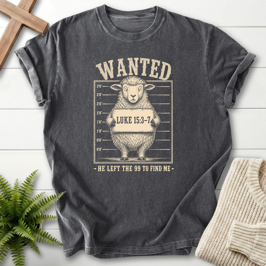 Flat lay of a Pepper Comfort Colors 1717 women's Christian tee featuring "He Left the 99 to Find me Dark T-Shirt" Luke 15:3-7.