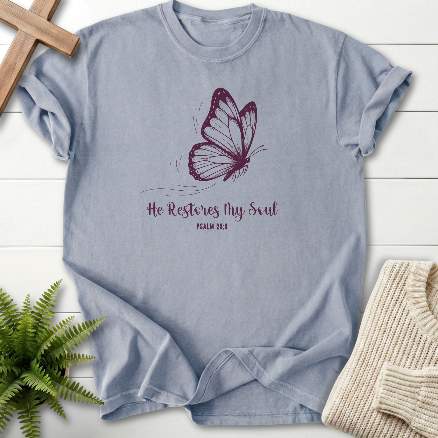 Granite women's Christian t-shirt with monarch butterfly artwork and "He Restores My Soul," inspired by Psalm 23:3