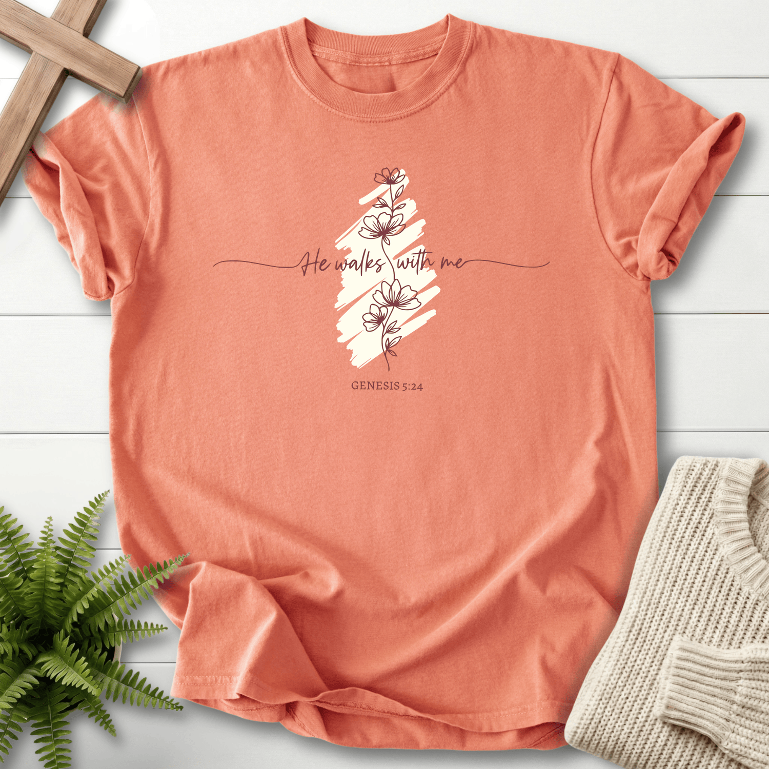 Terracotta women's Christian t-shirt with botanical line-art flowers and "He Walks With Me," inspired by Genesis 5:24