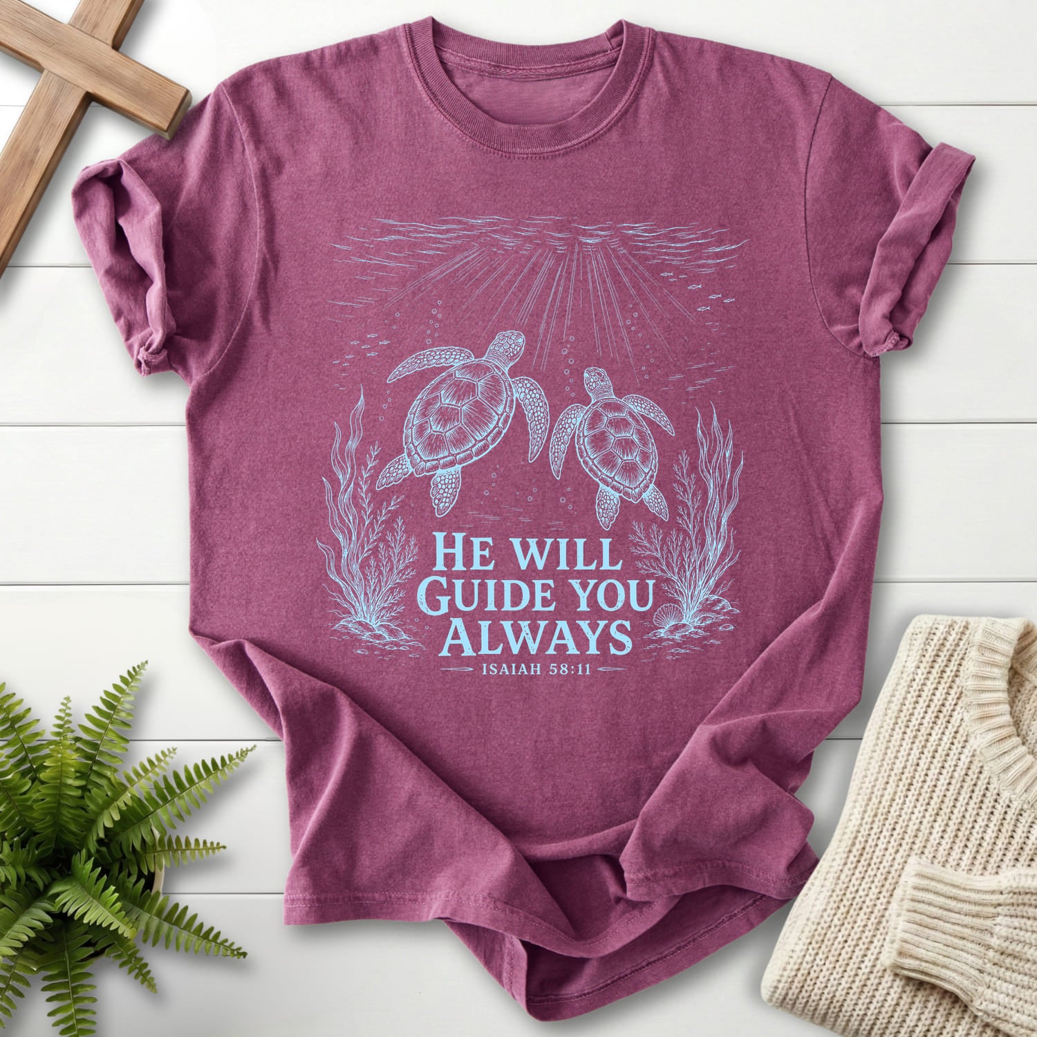 Flat lay of a Berry women's Christian tee featuring vine and grape artwork with "He Will Guide You Always Isaiah 58:11 T-Shirt" Isaiah 58:11.