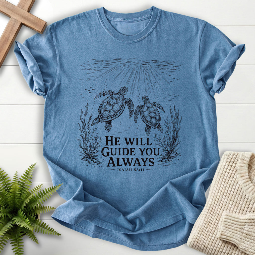 Flatlay of a Blue Jean faith-inspired shirt with vine and grape artwork with "He Will Guide You Always Isaiah 58:11 T-Shirt" Isaiah 58:11.
