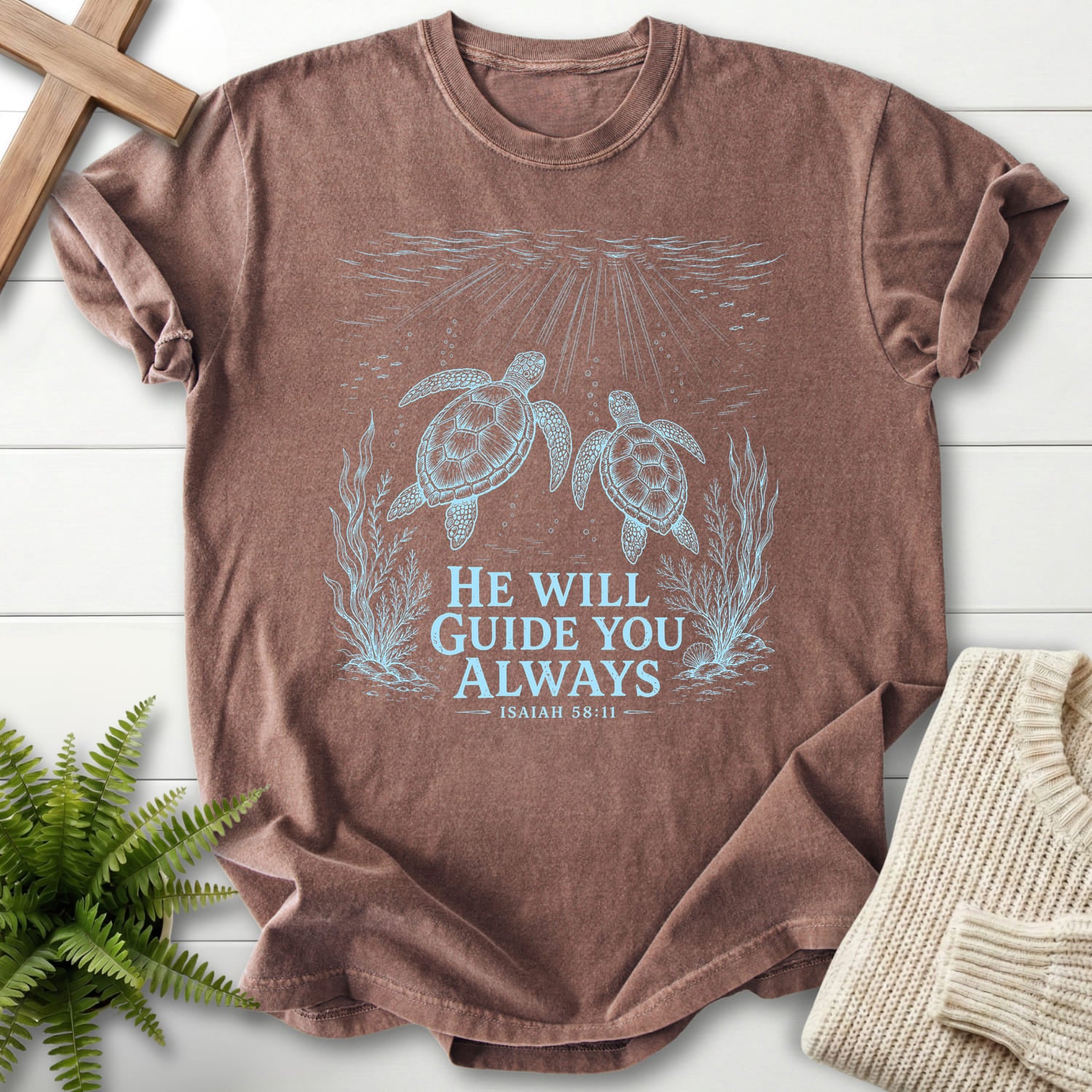 Flat lay of an Espresso Christian t-shirt for women featuring vine and grape artwork with "He Will Guide You Always Isaiah 58:11 T-Shirt" Isaiah 58:1.