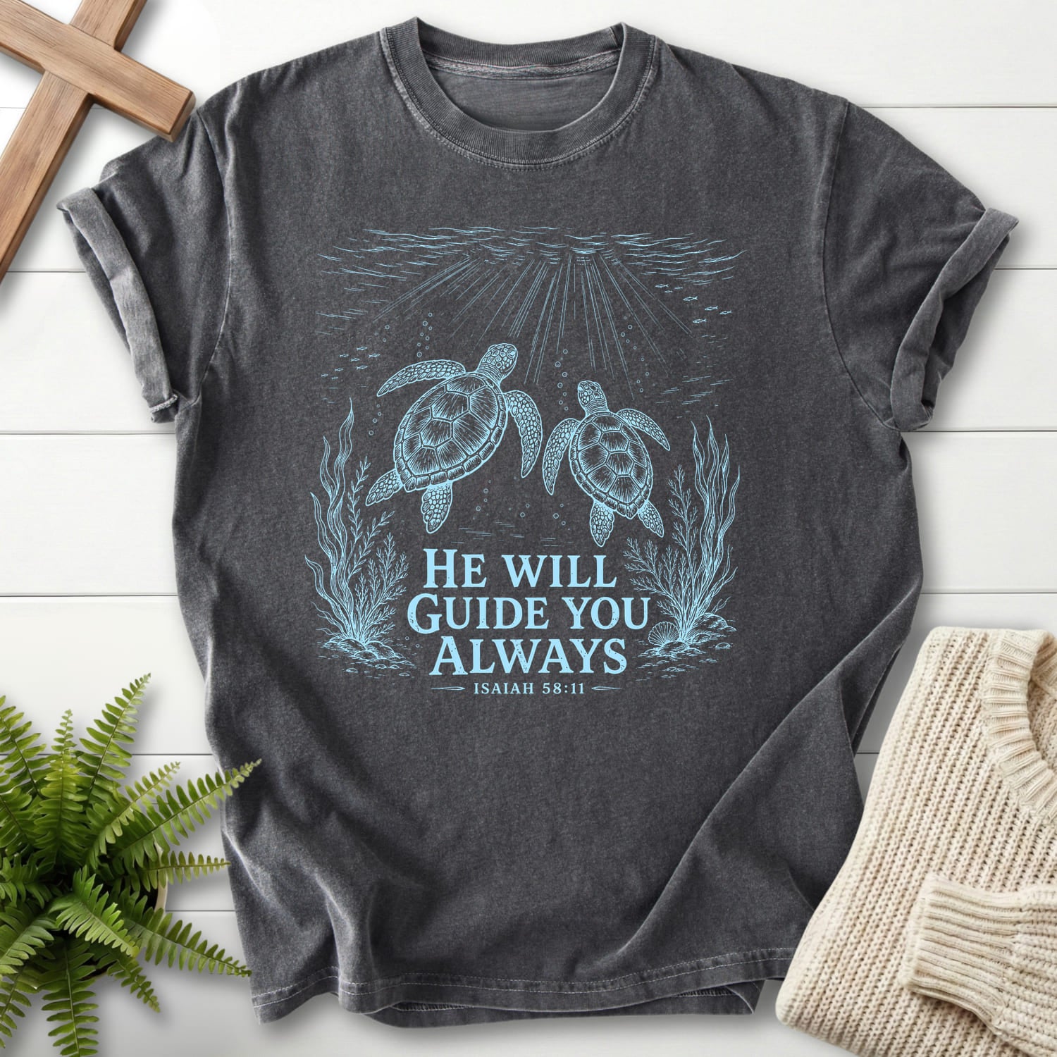 Flat lay of a Pepper Bible verse tee featuring vine and grape artwork with "He Will Guide You Always Isaiah 58:11 T-Shirt" Isaiah 58:11.