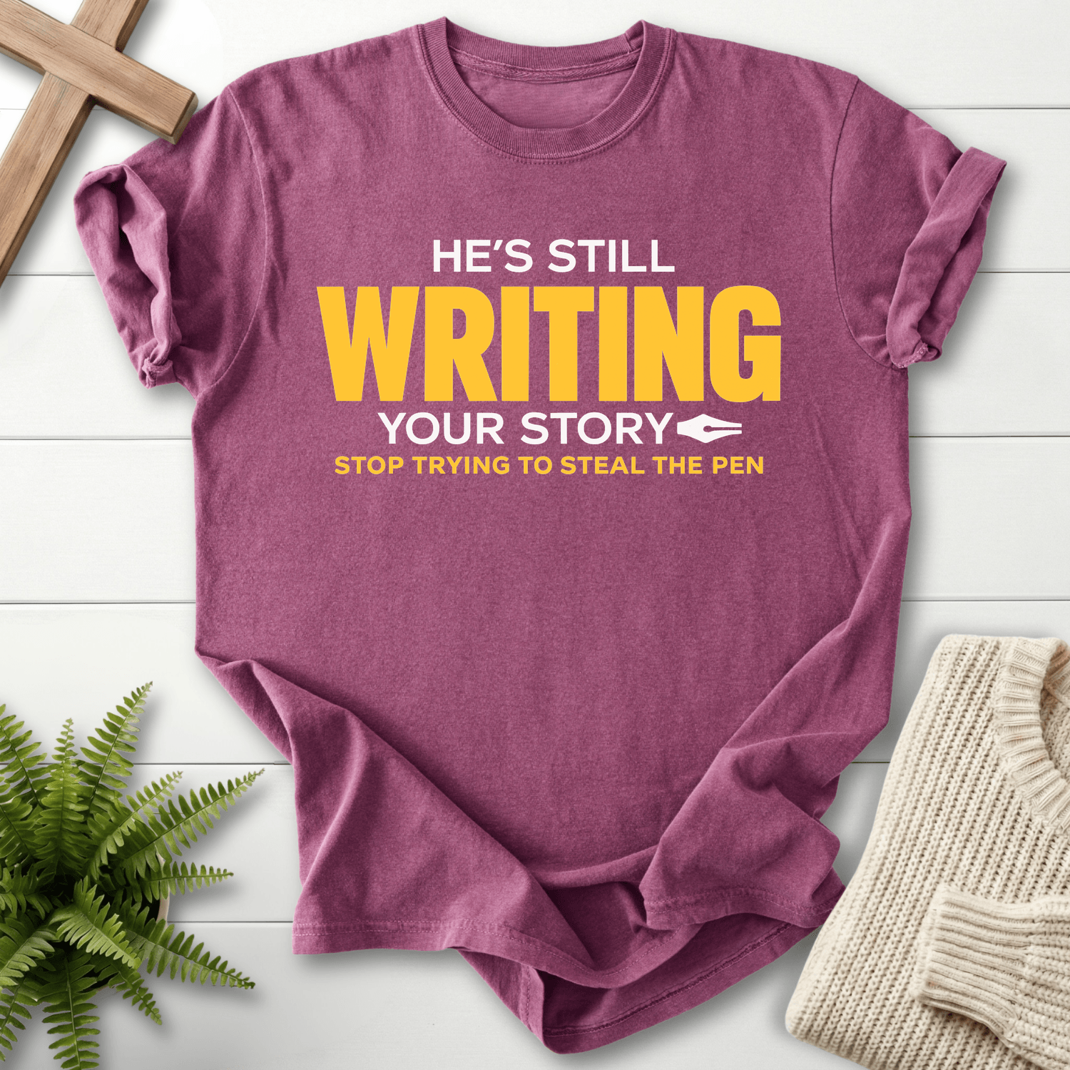 He's Still Writing Your Story T-Shirt in Berry | She Wears Faith