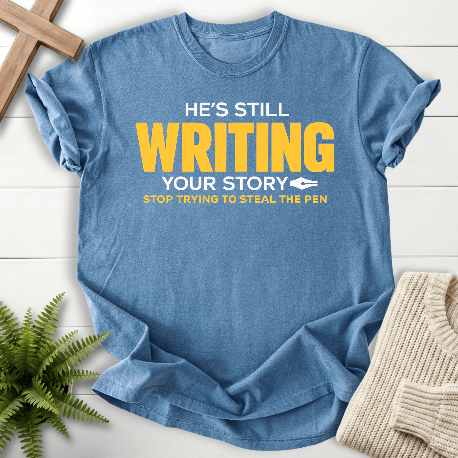 He's Still Writing Your Story T-Shirt in Blue Jean | She Wears Faith