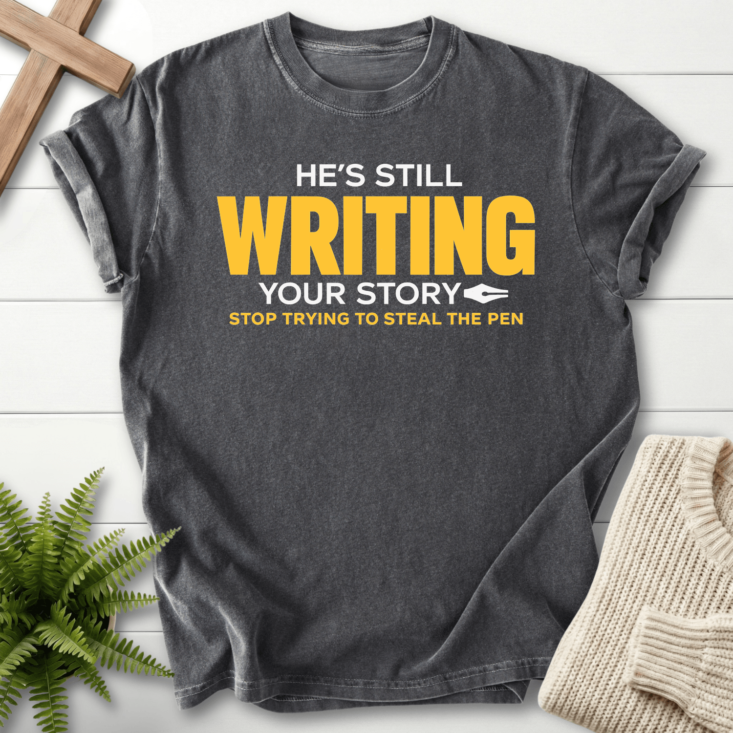 He's Still Writing Your Story T-Shirt in Pepper | She Wears Faith