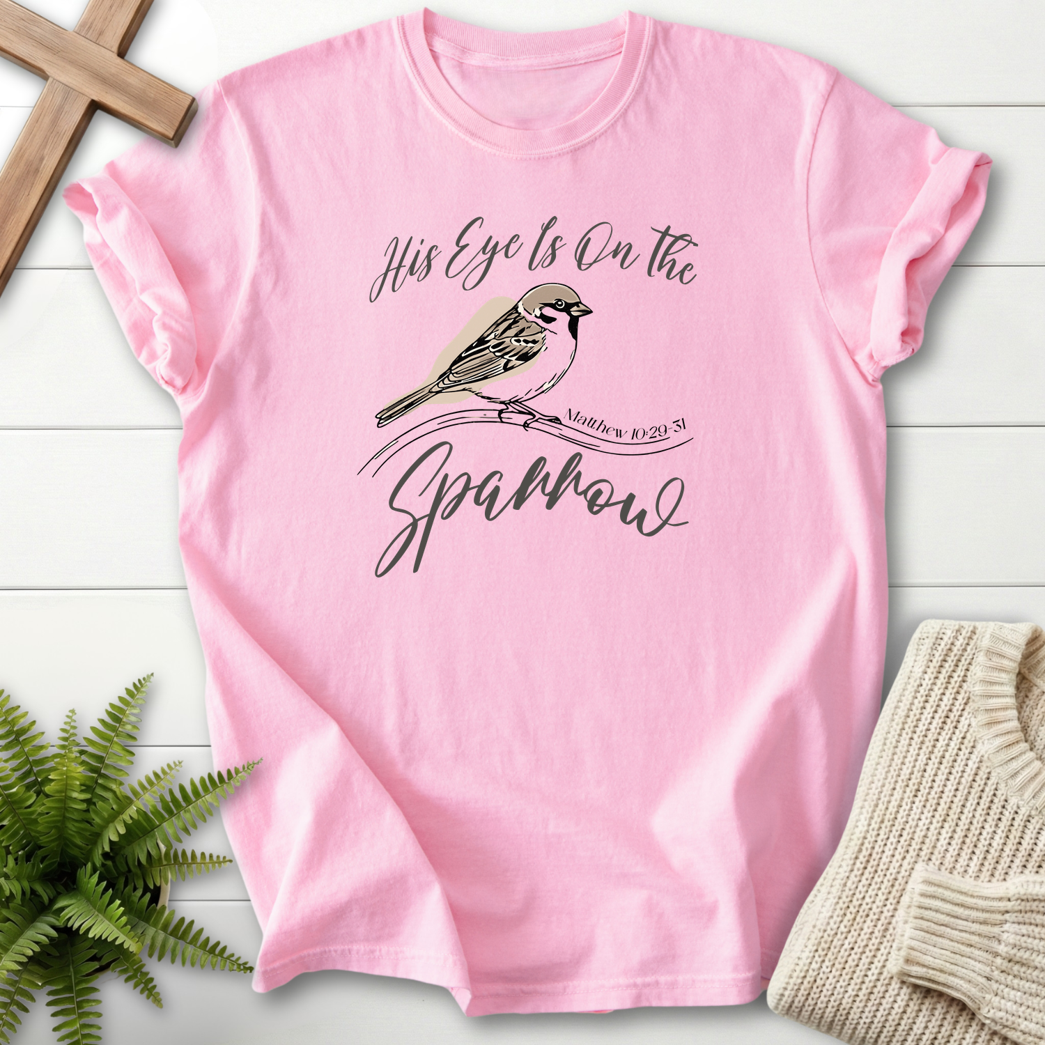 Blossom women's Christian t-shirt with sparrow-on-branch art and "His Eye Is on the Sparrow," inspired by Matthew 10:29-31
