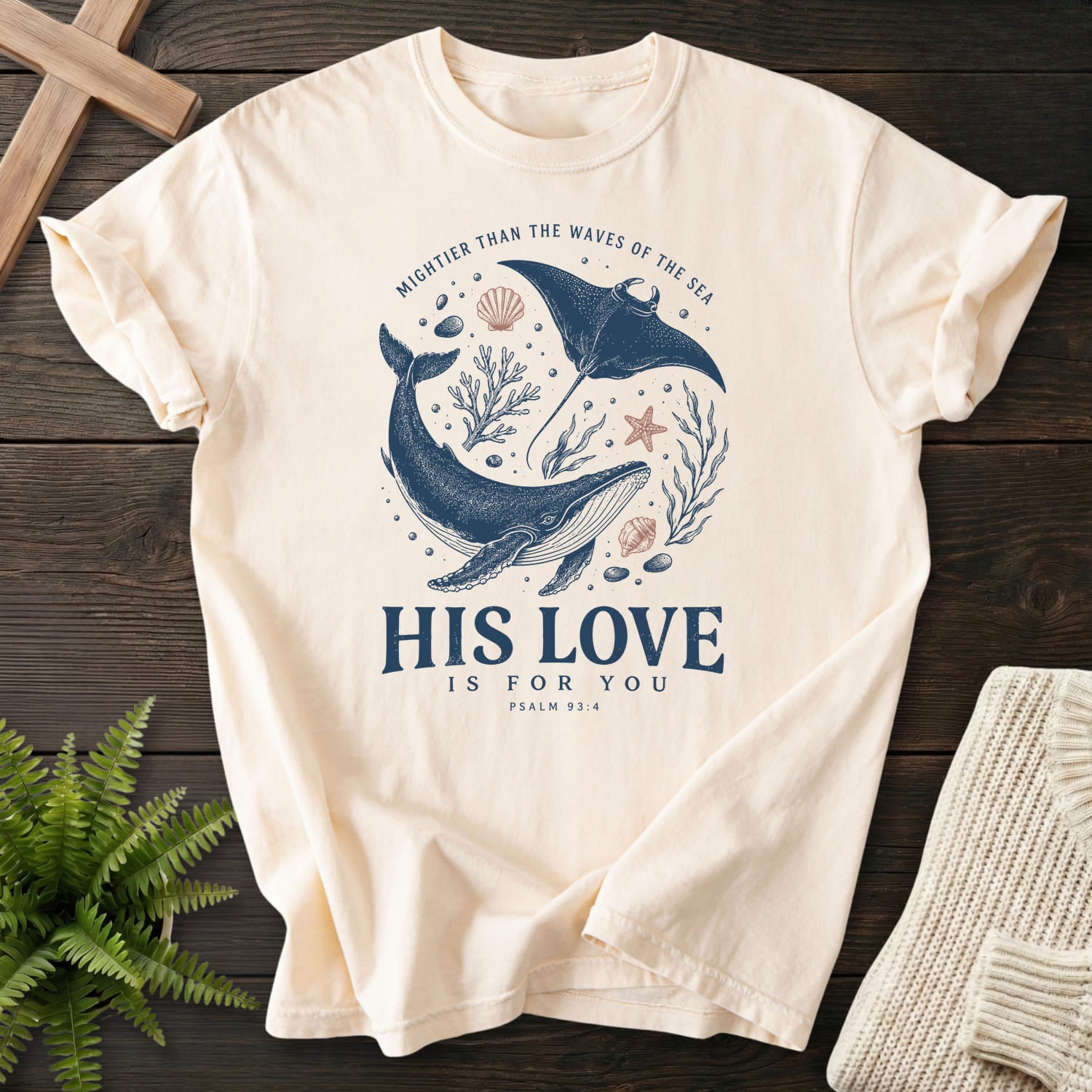 Flatlay of an Ivory Christian graphic tee with minimal whale artwork with "His Love Is For You Psalm 93 4 T-Shirt" Psalm 93:4.