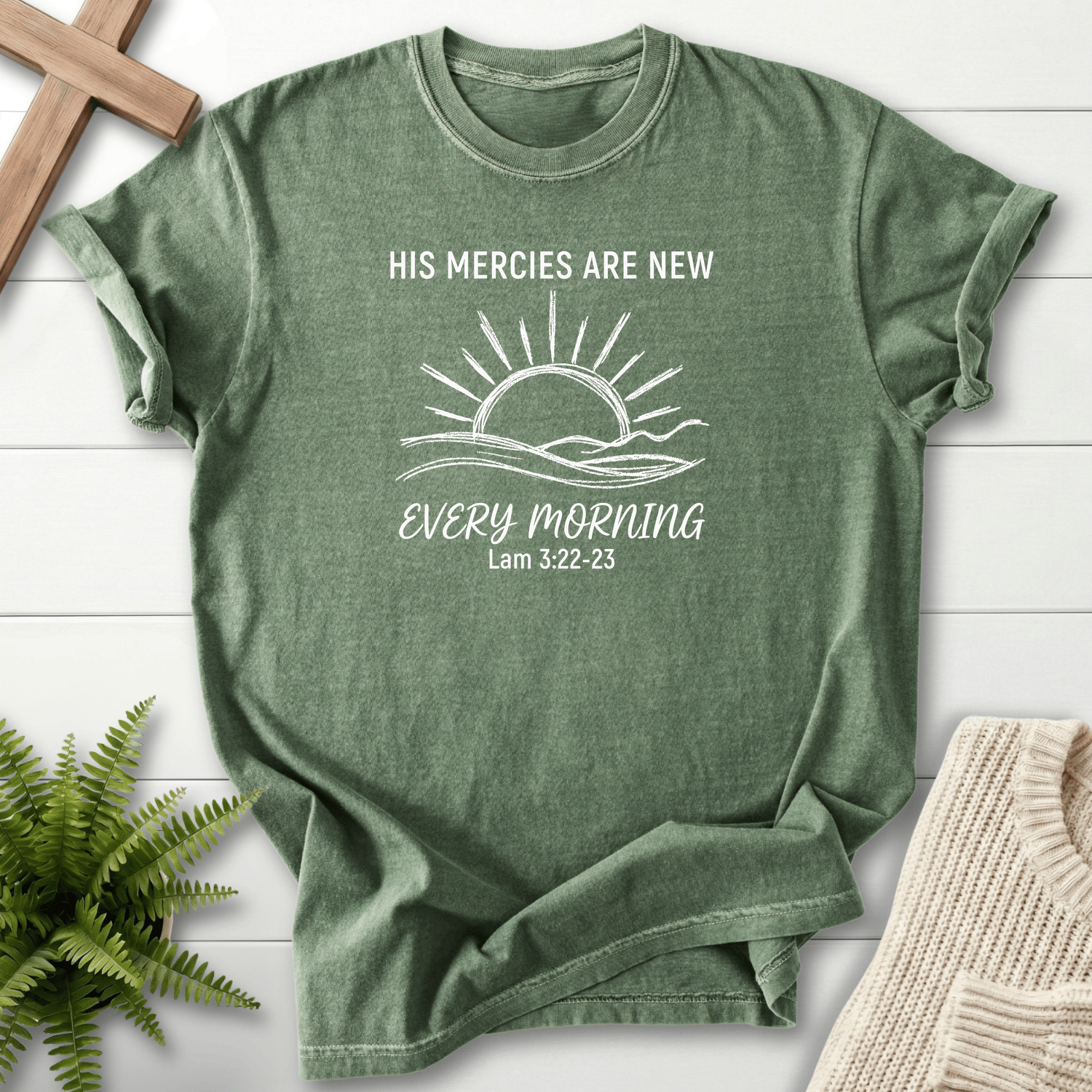 Moss women's Christian t-shirt with sunrise silhouette, inspired by Lamentations 3:22-23.