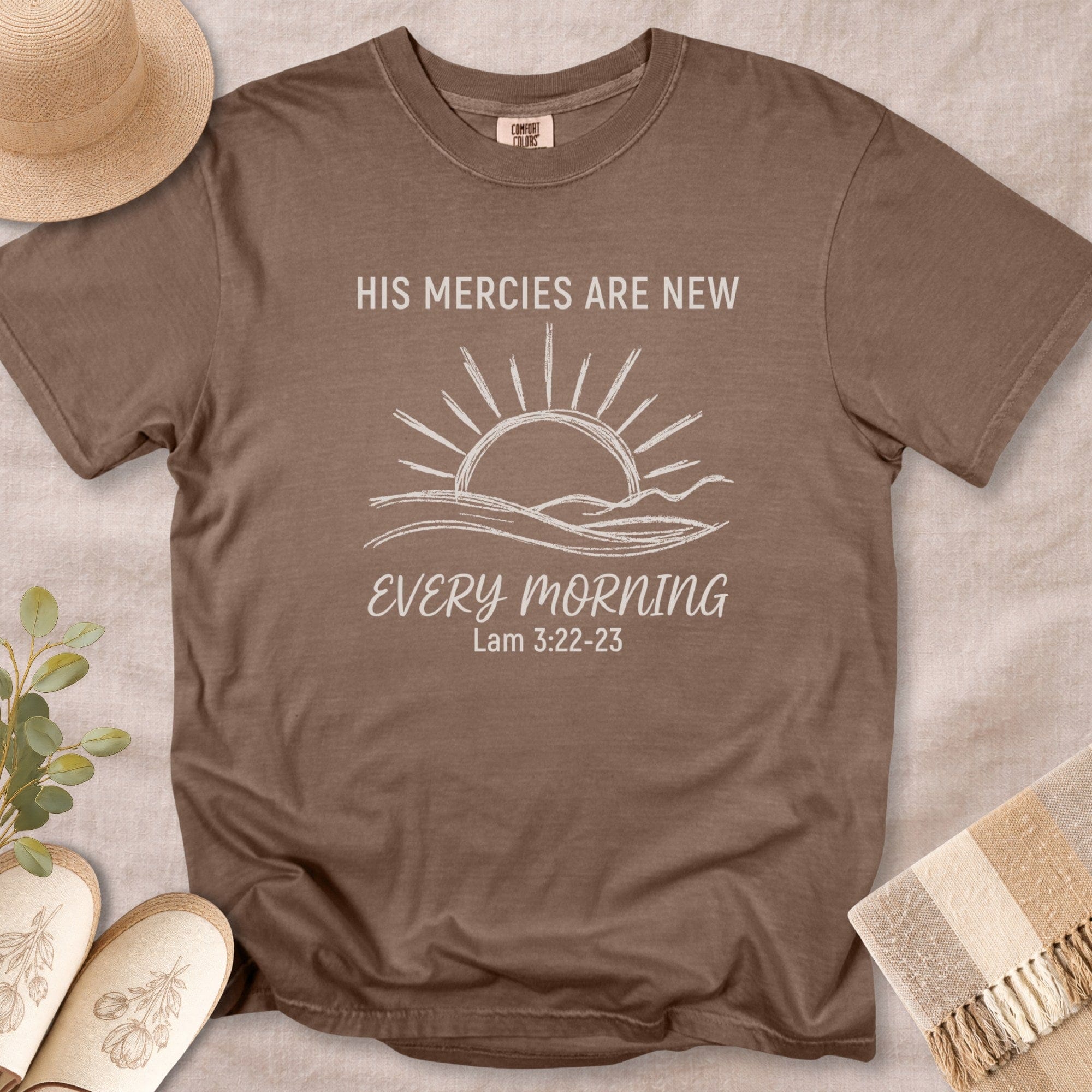 Espresso Brown Comfort Colors 1717 tshirt featuring a minimalist white sunrise design. A Christian women tee with the scripture "His Mercies Are New Every Morning" (Lamentations 3:22-23), ideal for US faith wear.