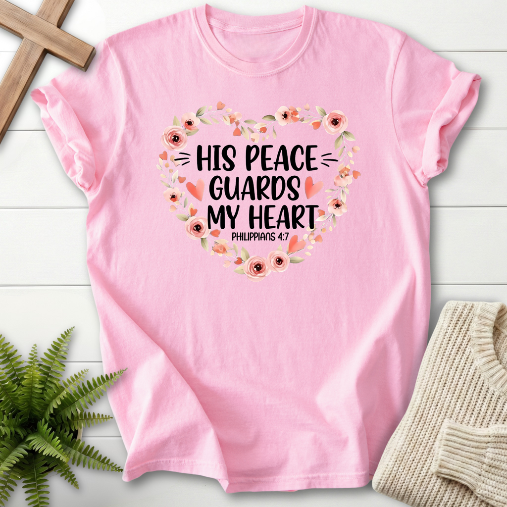 Blossom women's Christian t-shirt with a rose heart wreath and "His Peace Guards My Heart," inspired by Philippians 4:7