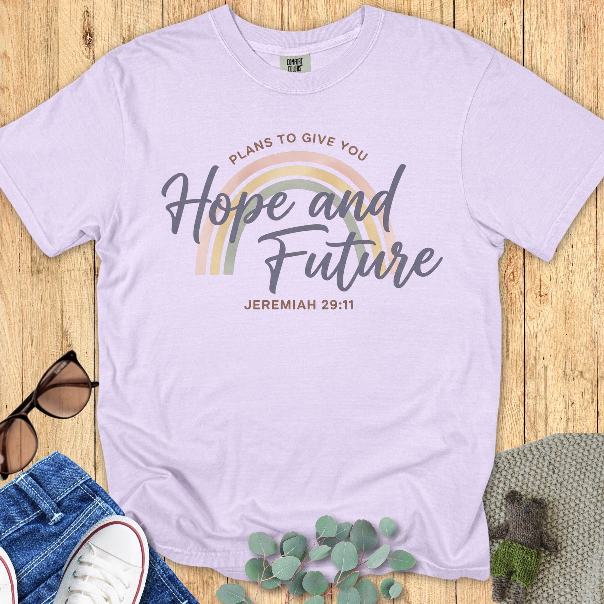 Comfort Colors 1717 orchid “Hope and Future – Jeremiah 29:11” t-shirt with a muted rainbow graphic and graceful lettering. A stylish women’s scripture tee — perfect modern Christian shirt and encouraging faith-based apparel for women.