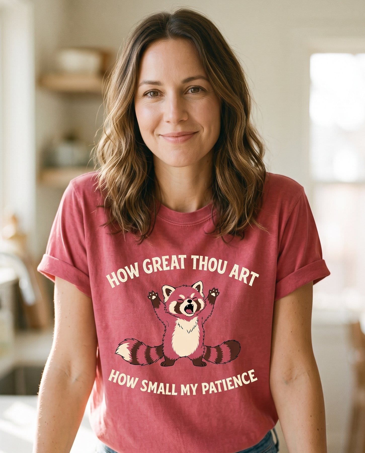 How Great Thou Art Red Panda – Crimson women's Christian tee, lifestyle photo in morning kitchen setting – A cartoon red panda throwing its paws up in a tantrum between the arch – How Great Thou Art (hymn) – She Wears Faith