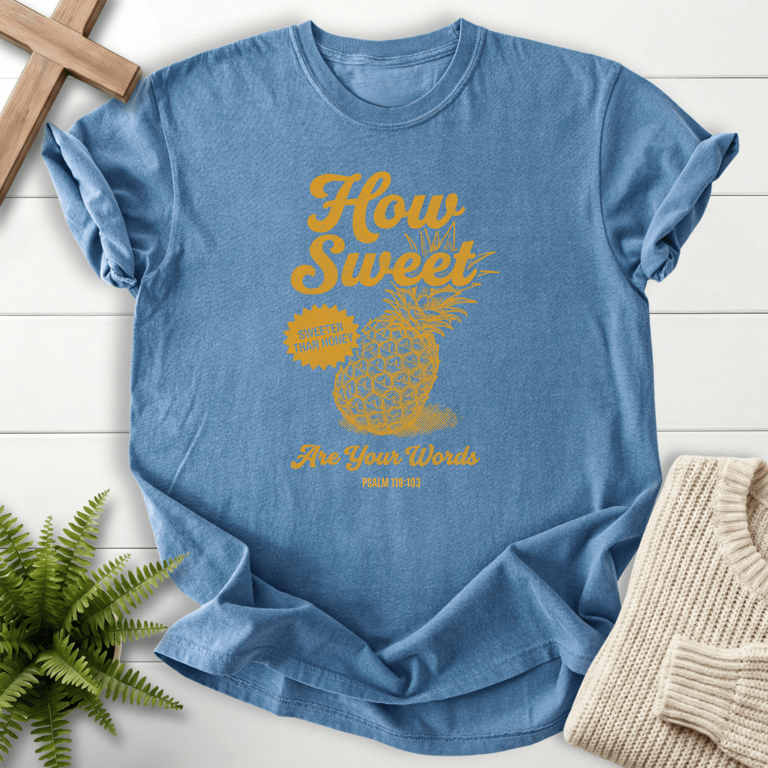 Blue Jean women's Christian t-shirt with a vintage pineapple graphic and golden script lettering, inspired by Psalm 119:103.