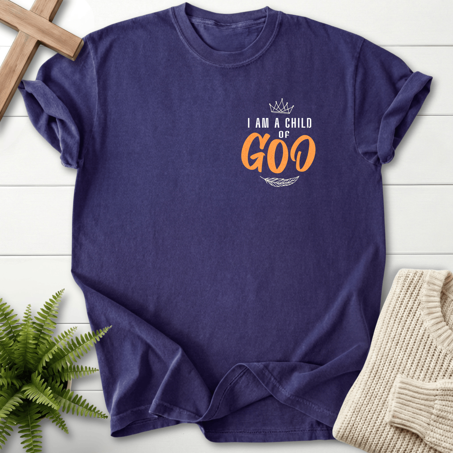 Grape women's Christian t-shirt with crown and orange accent lettering in a pocket-style chest design