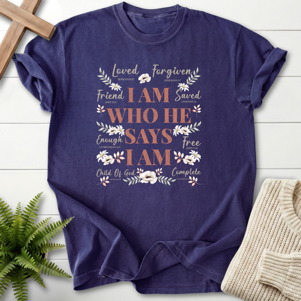 Grape women's Christian t-shirt with the "I Am Who He Says I Am" word collage and floral accents