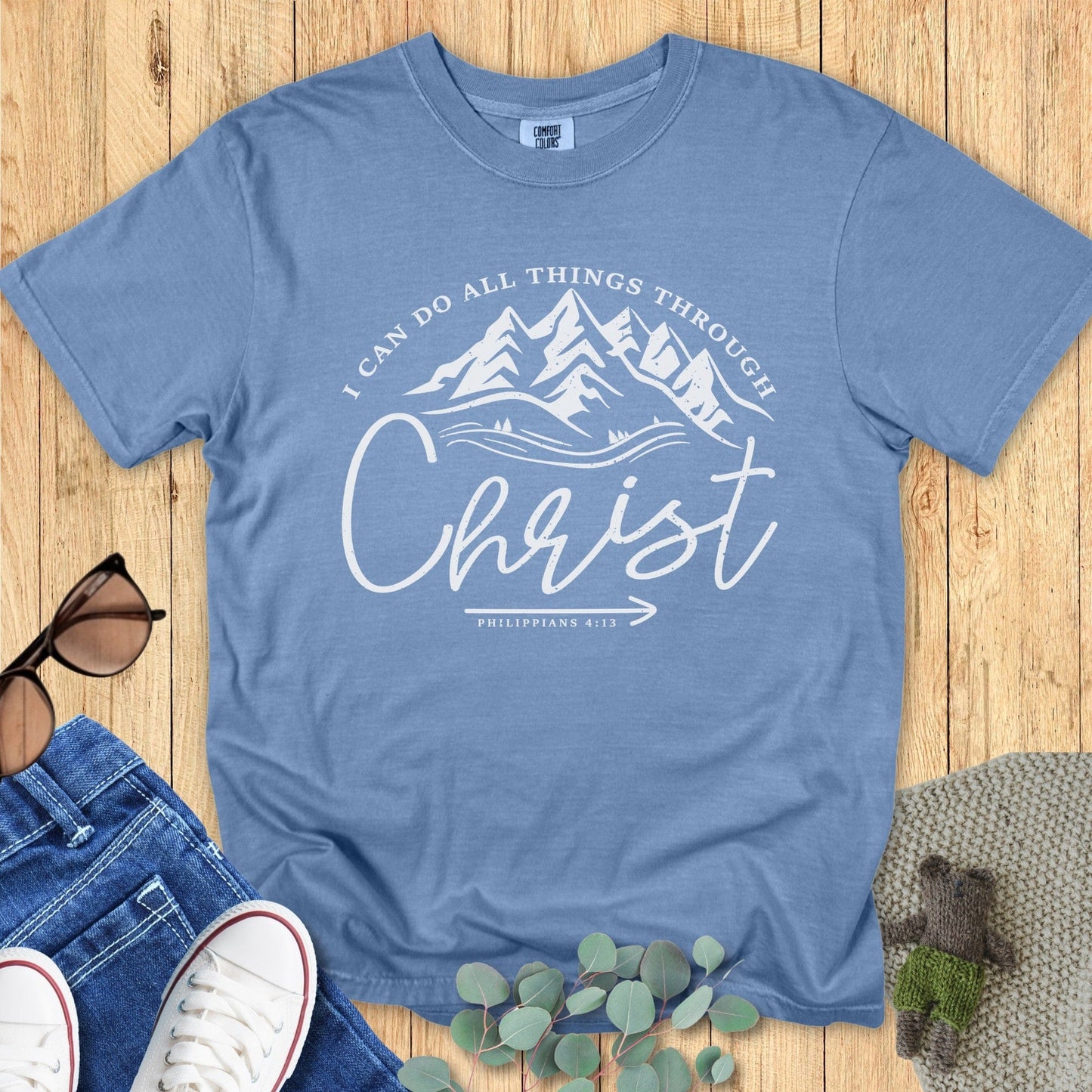 Comfort Colors 1717 blue jean “I Can Do All Things Through Christ – Philippians 4:13” t-shirt styled with casual outfit. A versatile modern Christian shirt ideal for daily wear or Christian mom gift ideas.