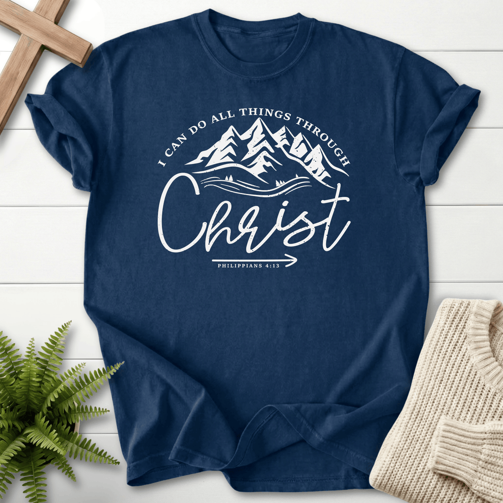 Navy women's Christian t-shirt with mountain circle art and Christ script, She Wears Faith
