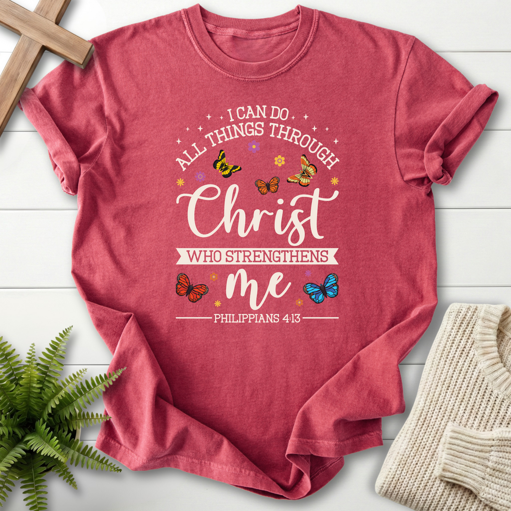 Crimson women's Christian t-shirt with colorful butterflies around "I Can Do All Things Through Christ," inspired by Philippians 4:13.