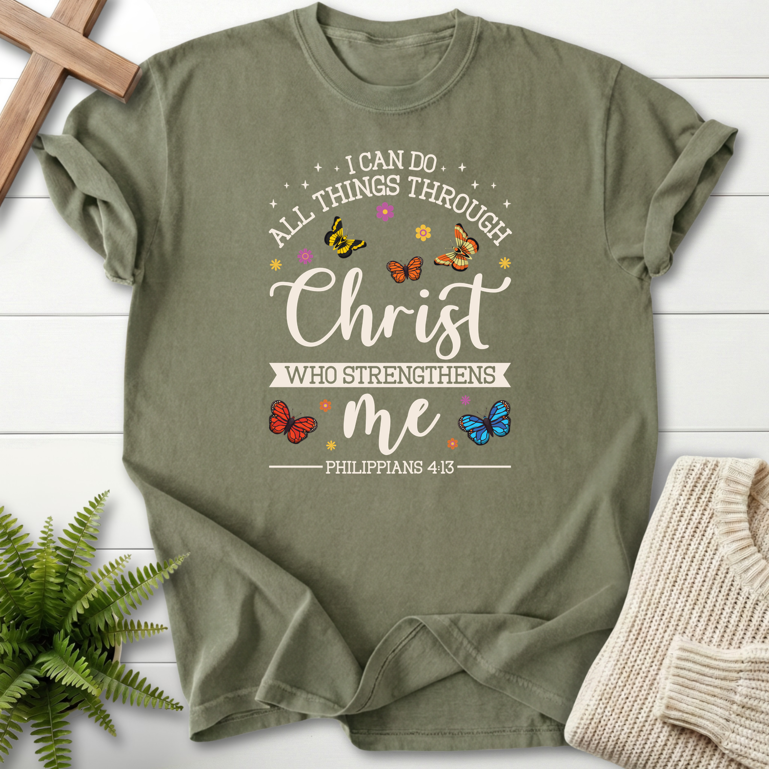 Sage women's Christian t-shirt with butterfly design and "I Can Do All Things Through Christ," inspired by Philippians 4:13.