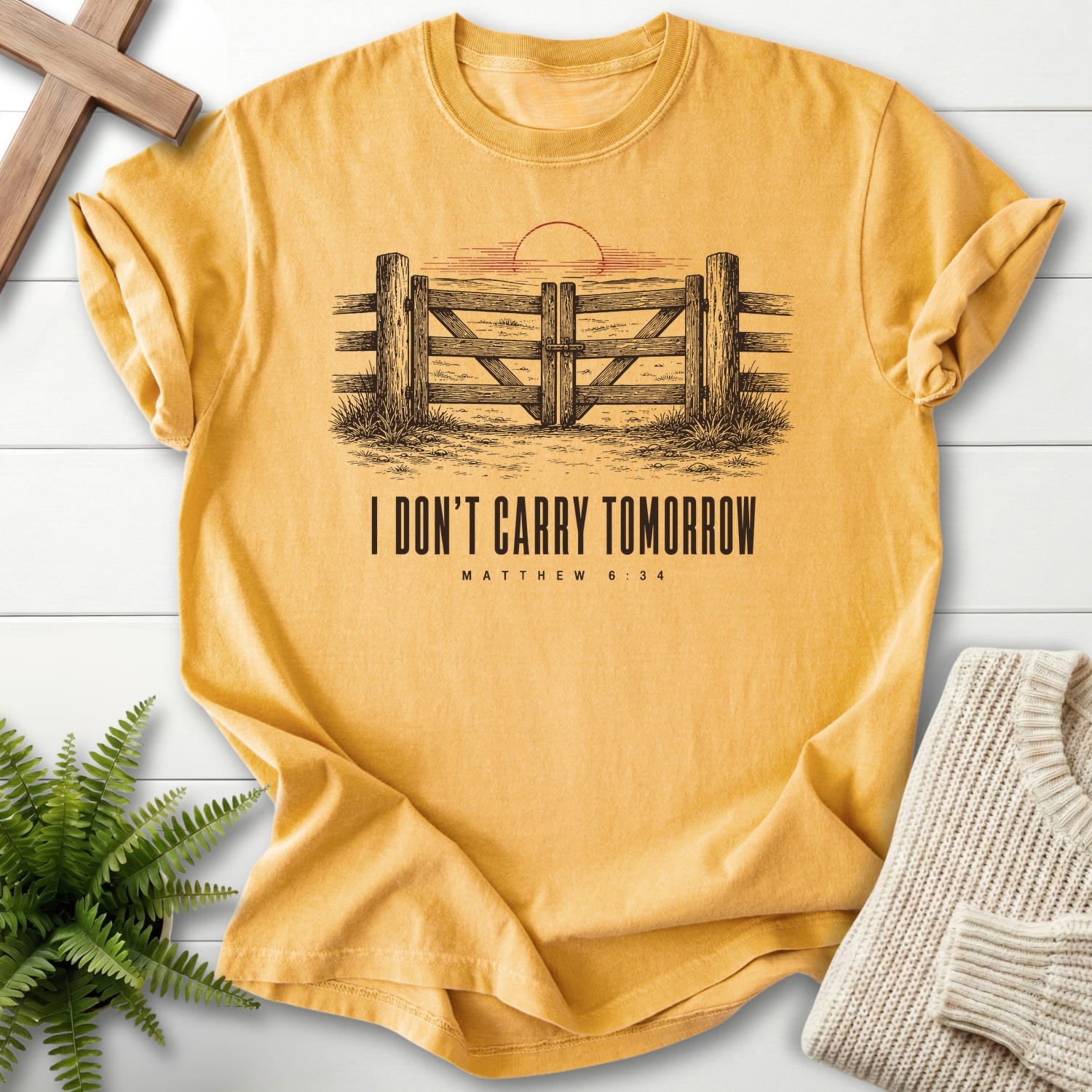 Mustard color option for the I Don't Carry Tomorrow Scripture shirt with "I Don't Carry Tomorrow T-Shirt" Matthew 6:34.