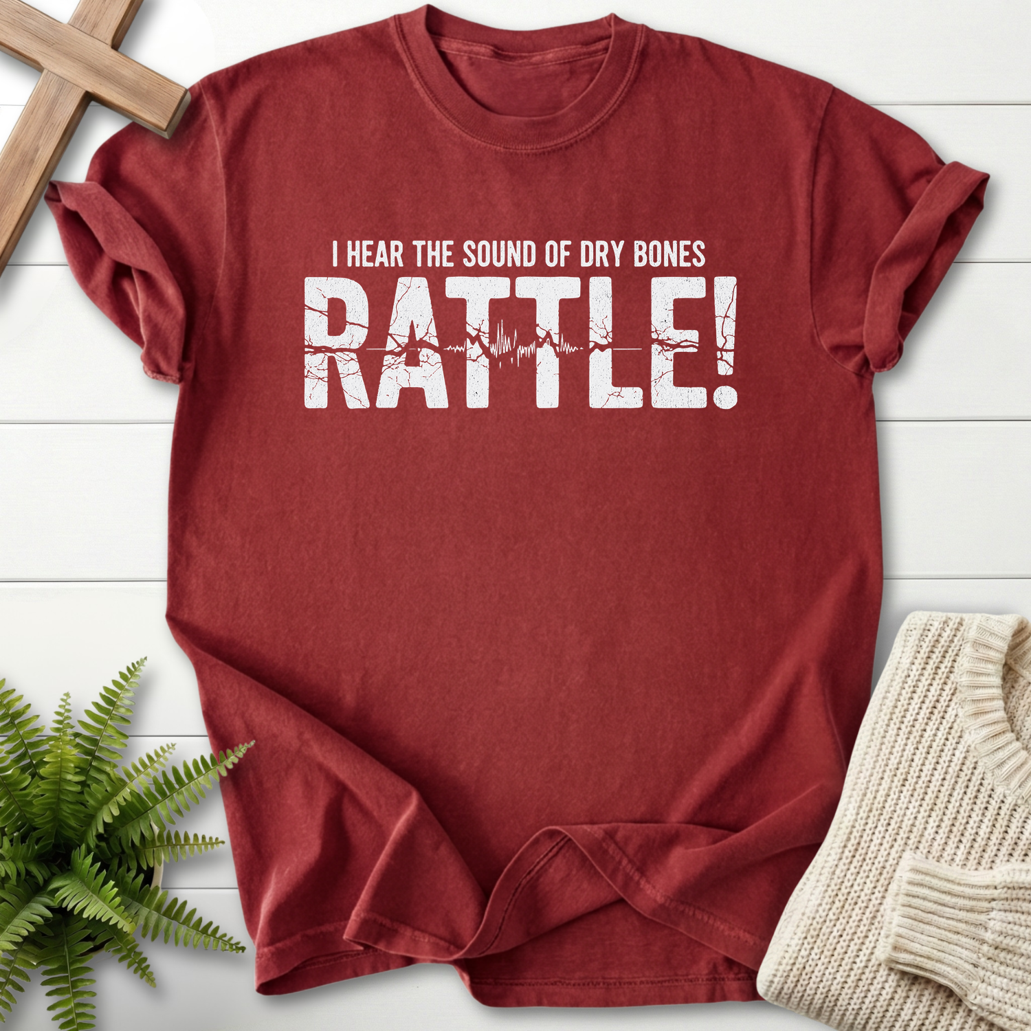 Brick women's Christian t-shirt with oversized RATTLE lettering and pulse detail