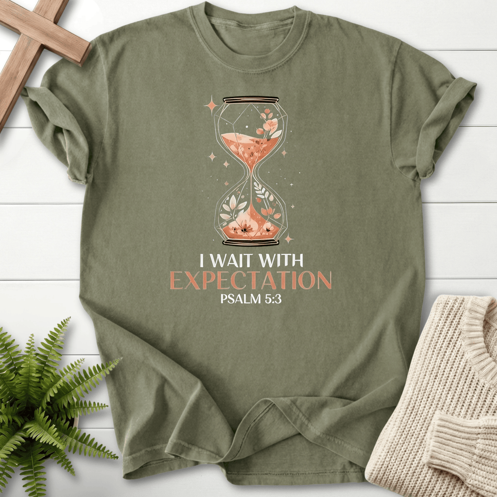 Sage women's Christian t-shirt with an ornate hourglass, wildflowers, and sparkles, inspired by Psalm 5:3.