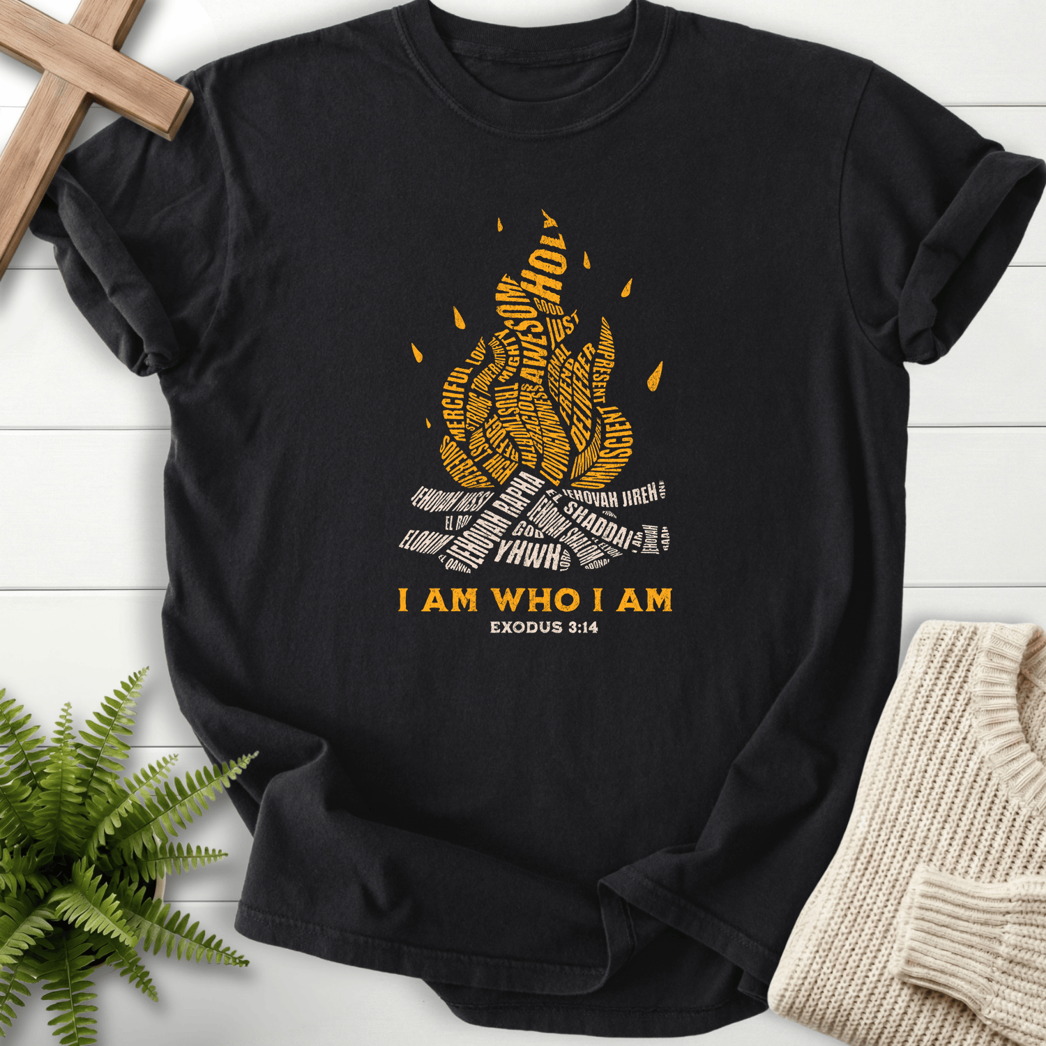 Black women's Christian t-shirt with Shaddai, YHWH, and Jehovah words shaped into flames, inspired by Exodus 3:14