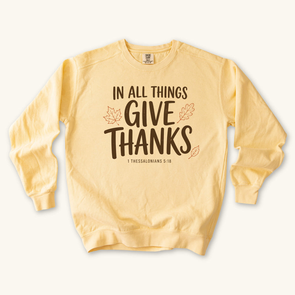 Butter In All Things Give Thanks sweatshirt flat lay mockup, 1 Thessalonians 5:18 Christian apparel for women