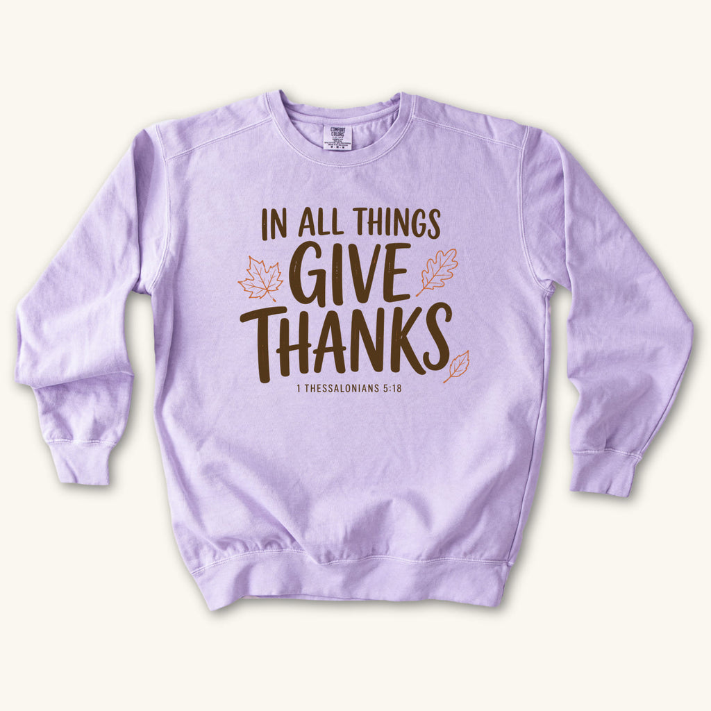 Orchid In All Things Give Thanks sweatshirt flat lay mockup, 1 Thessalonians 5:18 Christian apparel for women