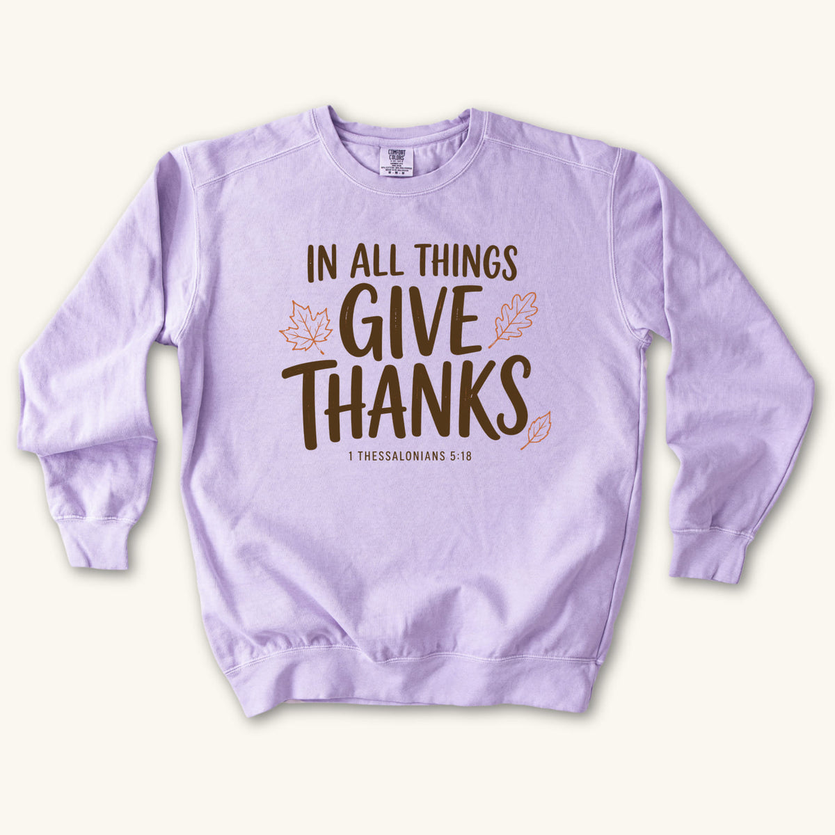 Orchid In All Things Give Thanks sweatshirt flat lay mockup, 1 Thessalonians 5:18 Christian apparel for women