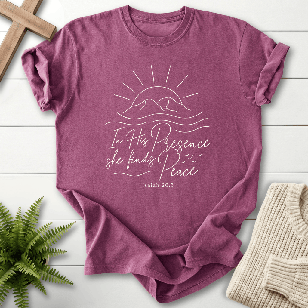 Berry women's Christian t-shirt with sunrise line art and a soft mountain glow, inspired by Isaiah 26:3.
