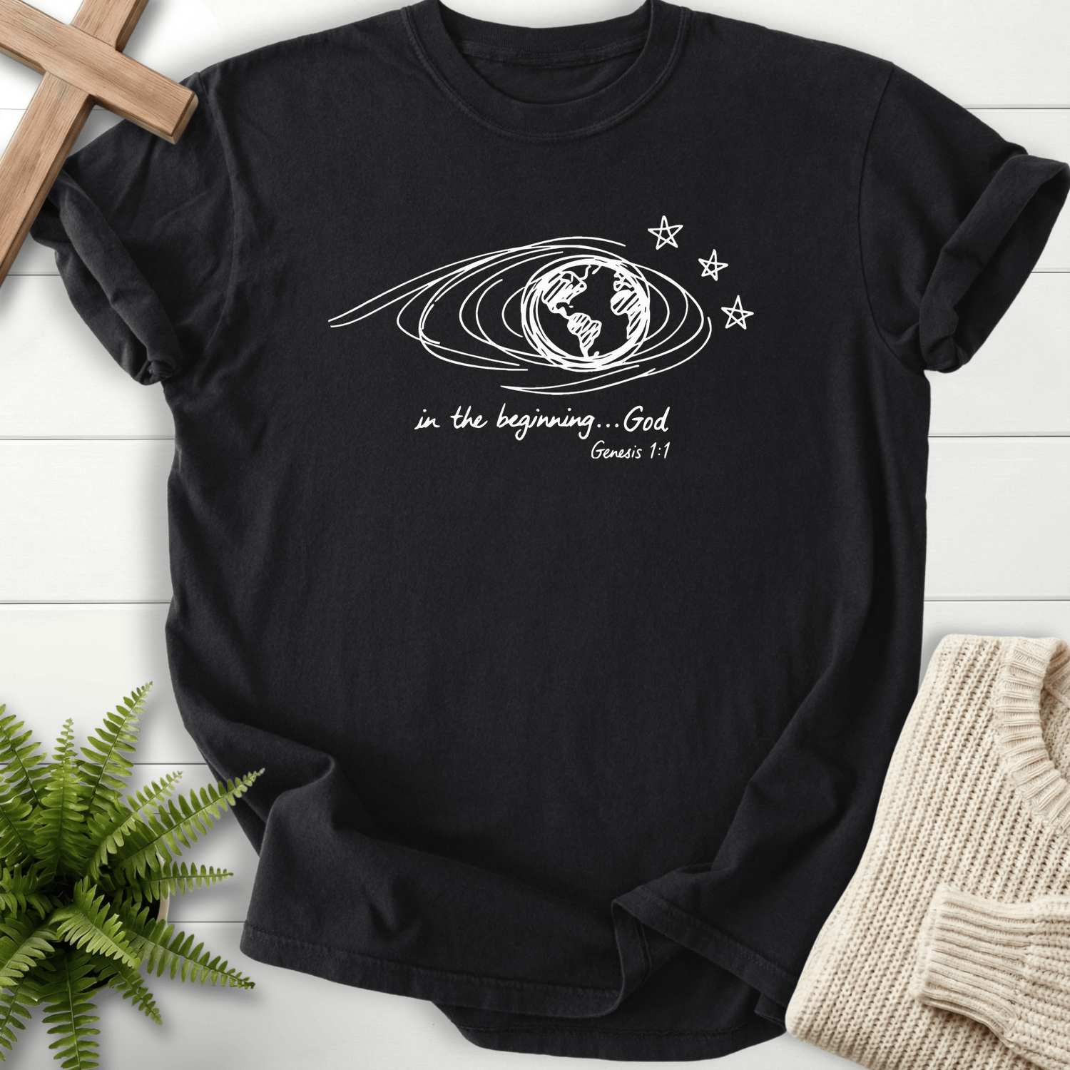 Black women's Christian t-shirt with orbital earth illustration, inspired by Genesis 1:1