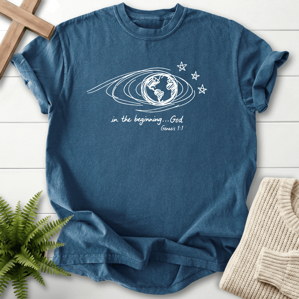 Midnight women's Christian t-shirt with a minimalist globe swirl and star art, inspired by Genesis 1:1