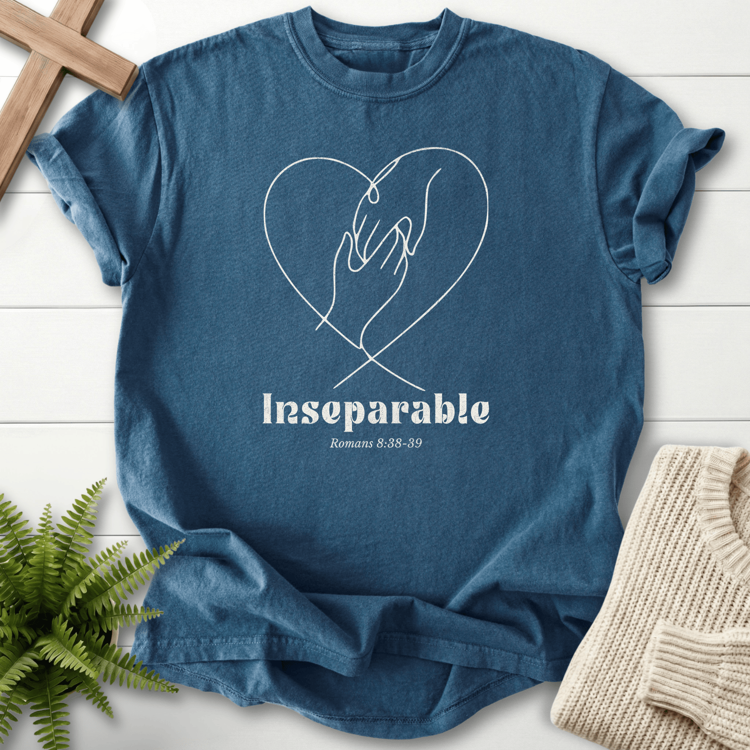 Midnight Christian t-shirt for women with a holding-hands heart design, inspired by Romans 8:38-39.