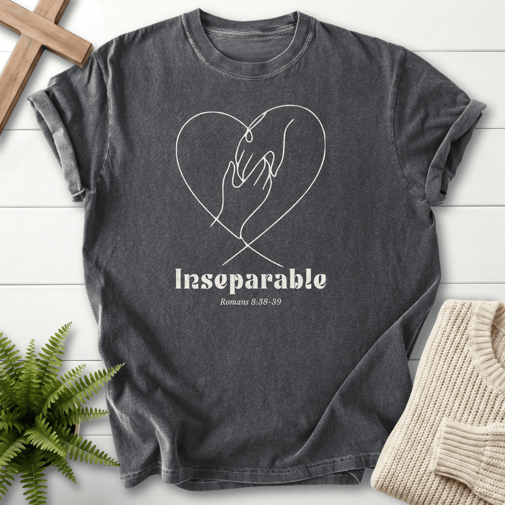 Pepper Christian t-shirt for women with two hands clasped inside a line-art heart, inspired by Romans 8:38-39.