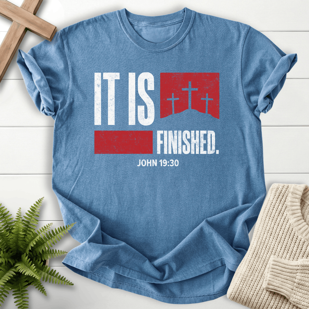 Blue Jean women's Christian t-shirt with "It Is Finished" and three crosses on a red banner, inspired by John 19:30