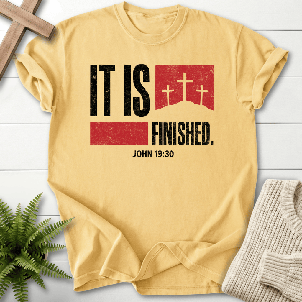 Butter women's Christian t-shirt with a grunge "It Is Finished" design and cross banner, inspired by John 19:30