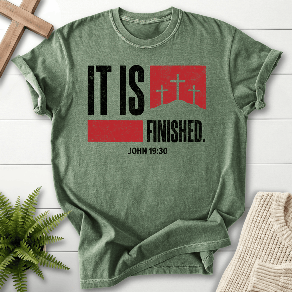 Moss women's Christian t-shirt with bold "It Is Finished" text and a cross graphic, inspired by John 19:30
